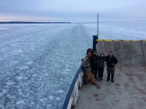Researchers from Wild Madeline project on the ferry to Madeline Island.