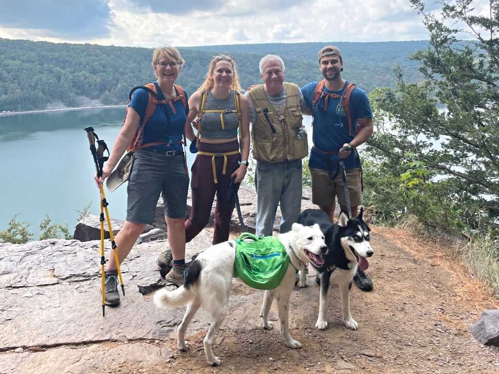 NRF's new director of philanthropy Marta Weldon (left) atop Devils Lak with family and dogs. Courtesy of Marta Weldon.