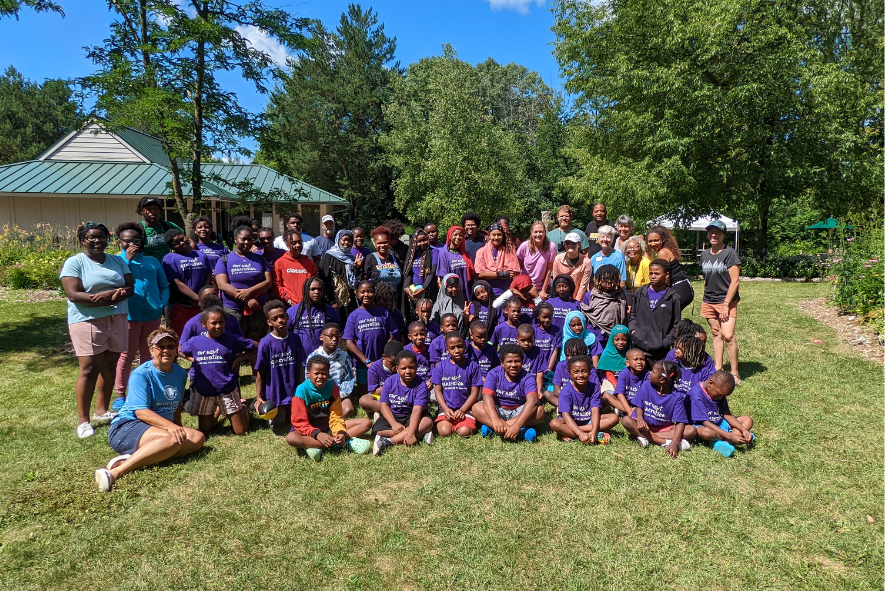 Group of students outside of a nature center - diversity in the outdoors blog photo