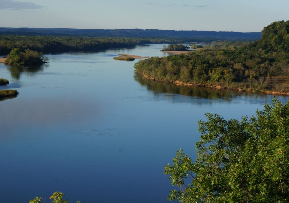 Impact area - lands and waters, large body of water surrounding by trees