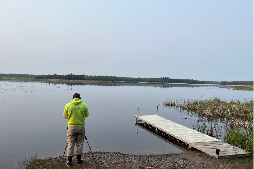 Frank Schroyer scanning the marsh at Lower Ninemile Lake in Vilas County. Photo by Troy 