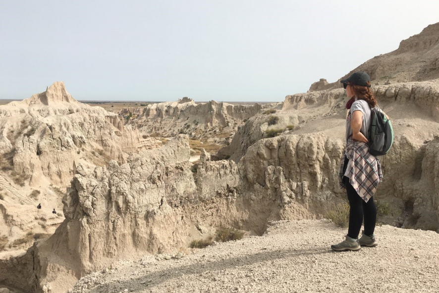 Blog Post Photo Dimensions 43 (86) New Executive Assistant, Michaela on a hike in Badlands National Park.