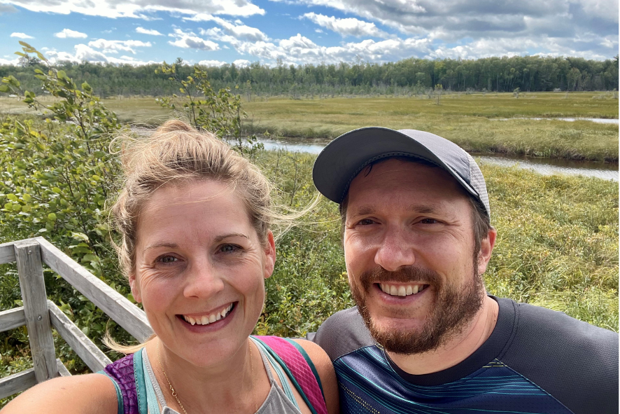 Welcome Brenna New Grant Writer, Brenna, on a hike at Big Bay State Park.