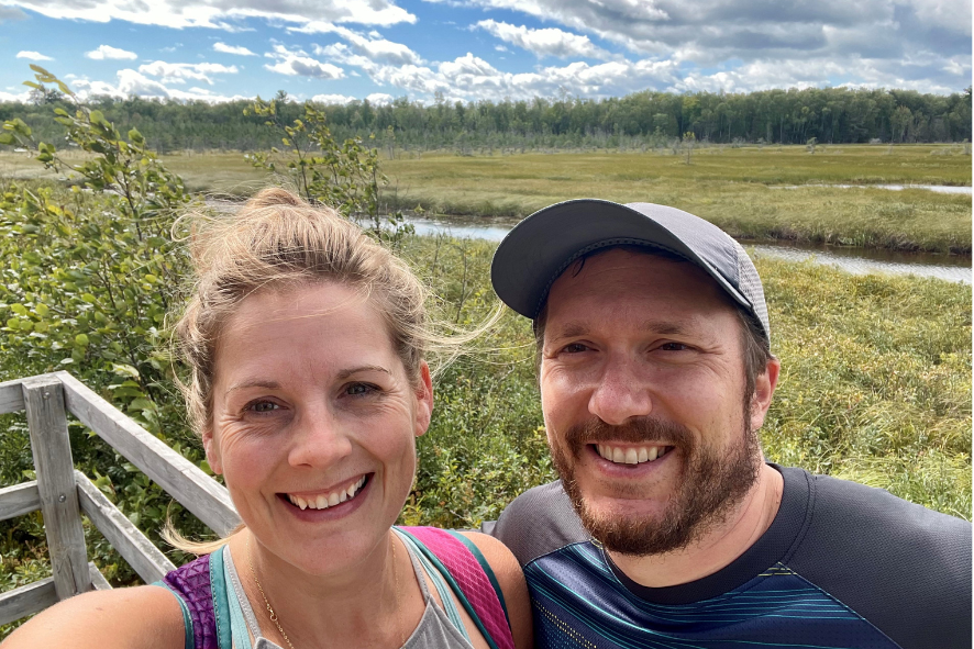 New Grant Writer, Brenna, on a hike at Big Bay State Park.