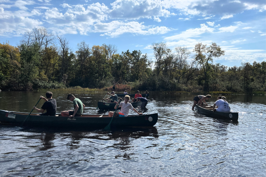 Students canoeing on the Namekagon River